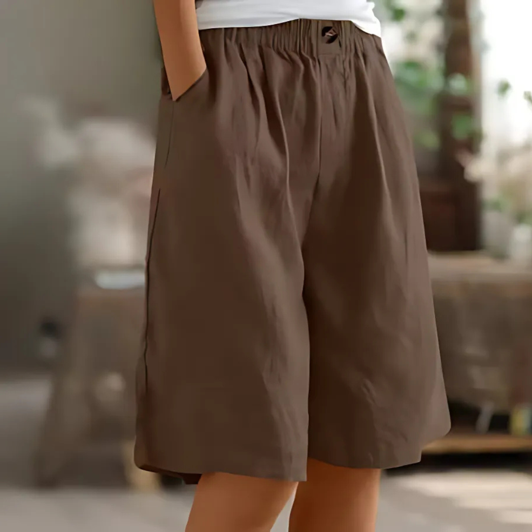 Maisie women's brown elastic waist Bermuda shorts with pockets, perfect for relaxed sunny-day styling.