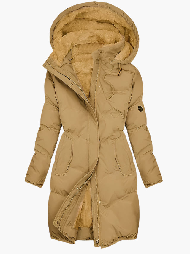 Tan longline puffer coat with a plush-lined hood, full-length zip, and a feminine shaped waist for winter warmth.