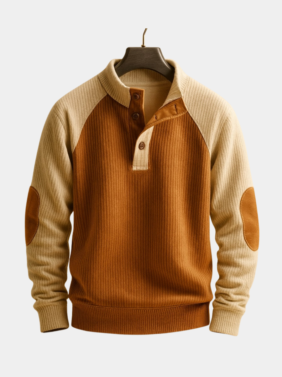 Men's ribbed knit jumper in brown and beige with a button-neck placket, raglan sleeves, and suede elbow patches.