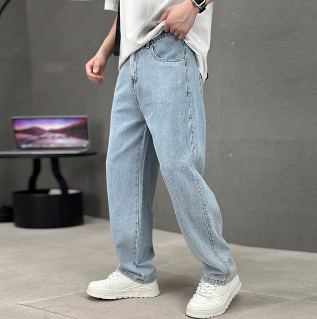 Men wearing light-wash blue denim straight-leg jeans with a relaxed fit and classic five-pocket styling.