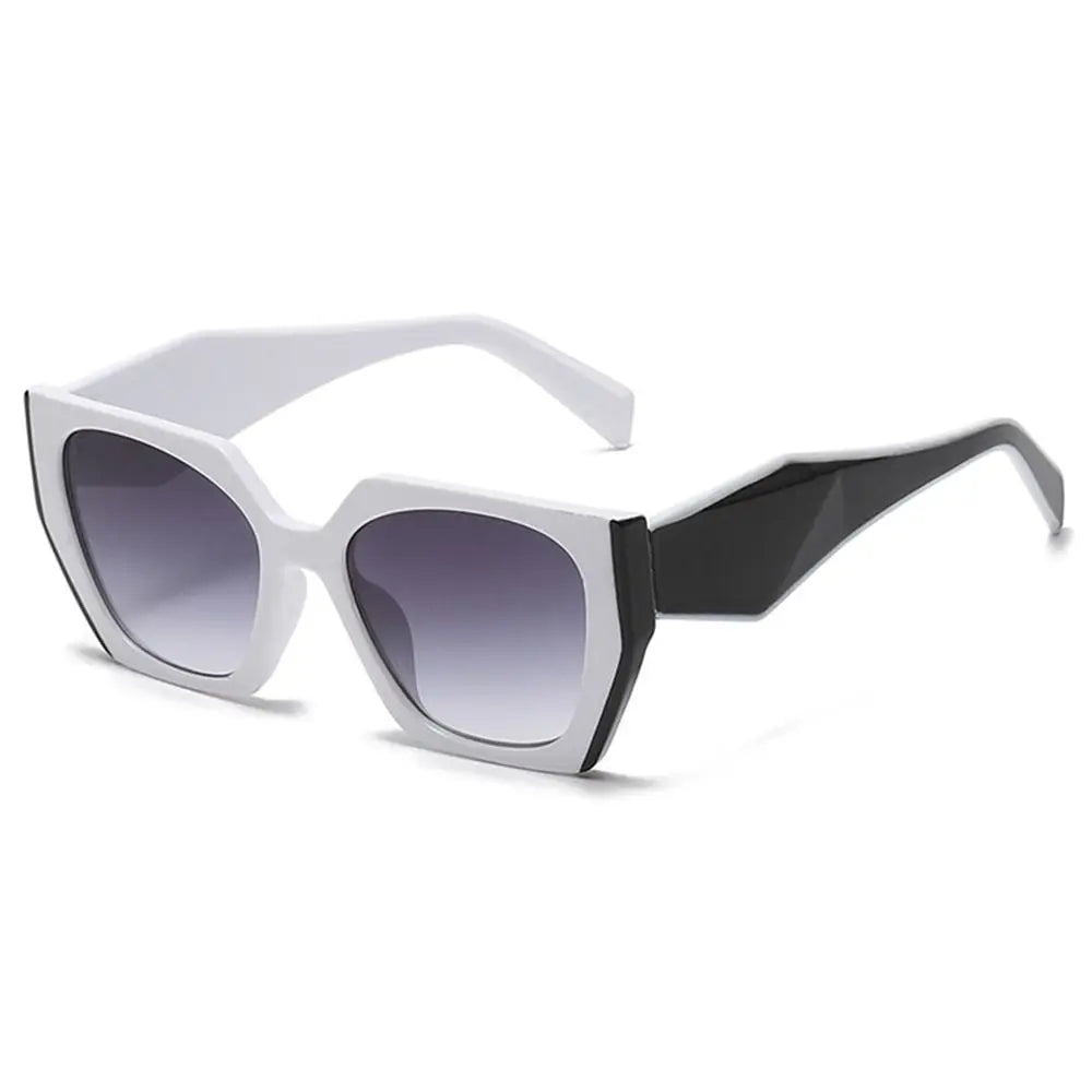 Margot women's oversized square sunglasses with a bold white frame, black temples, and polished gradient lenses.
