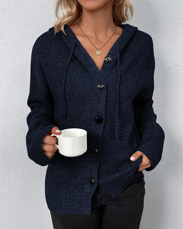 Navy blue hooded knit cardigan with a button-front closure, drawstring detail, and ribbed cuffs for a cozy, relaxed fit.