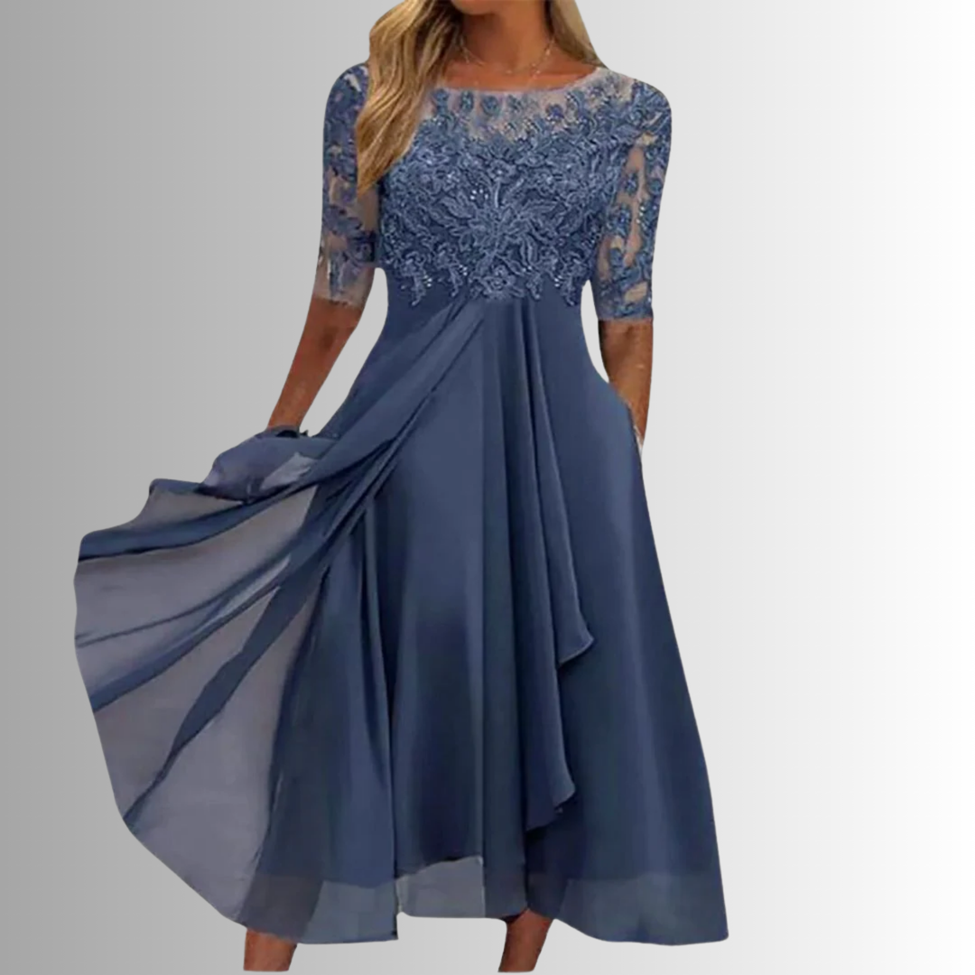 Matilda women's blue lace maxi dress with delicate lace top, flowing layered skirt, and full back coverage.