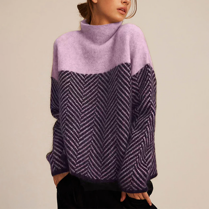 Oversized high neck jumper in lilac and dark purple with a two-tone herringbone knit pattern and relaxed fit.