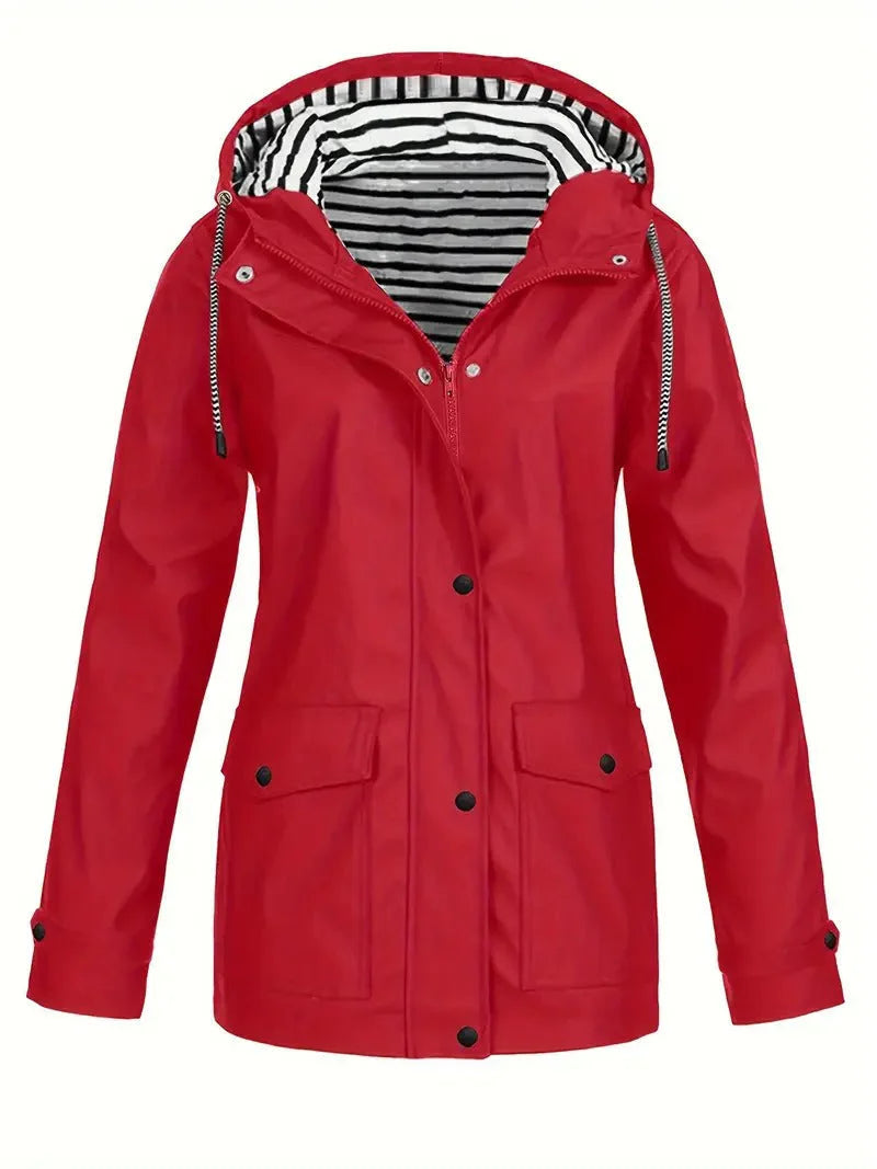 Red waterproof hooded rain jacket featuring a black and white striped lining, snap-down storm flap, and front pockets.