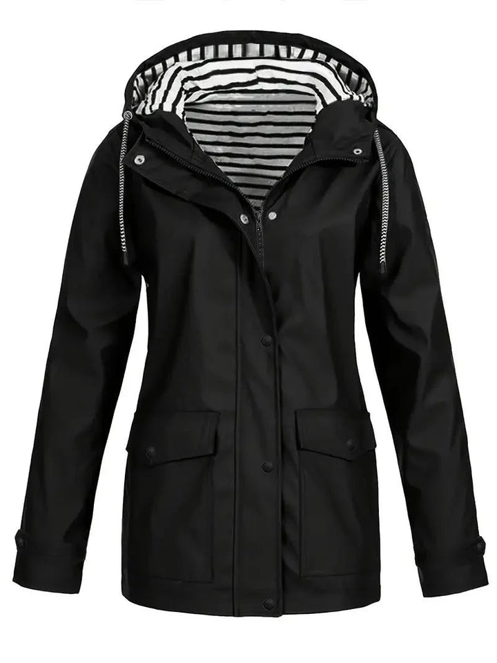 Black waterproof rain jacket with a drawstring hood, snap-down storm flap, and a stylish black and white striped lining.