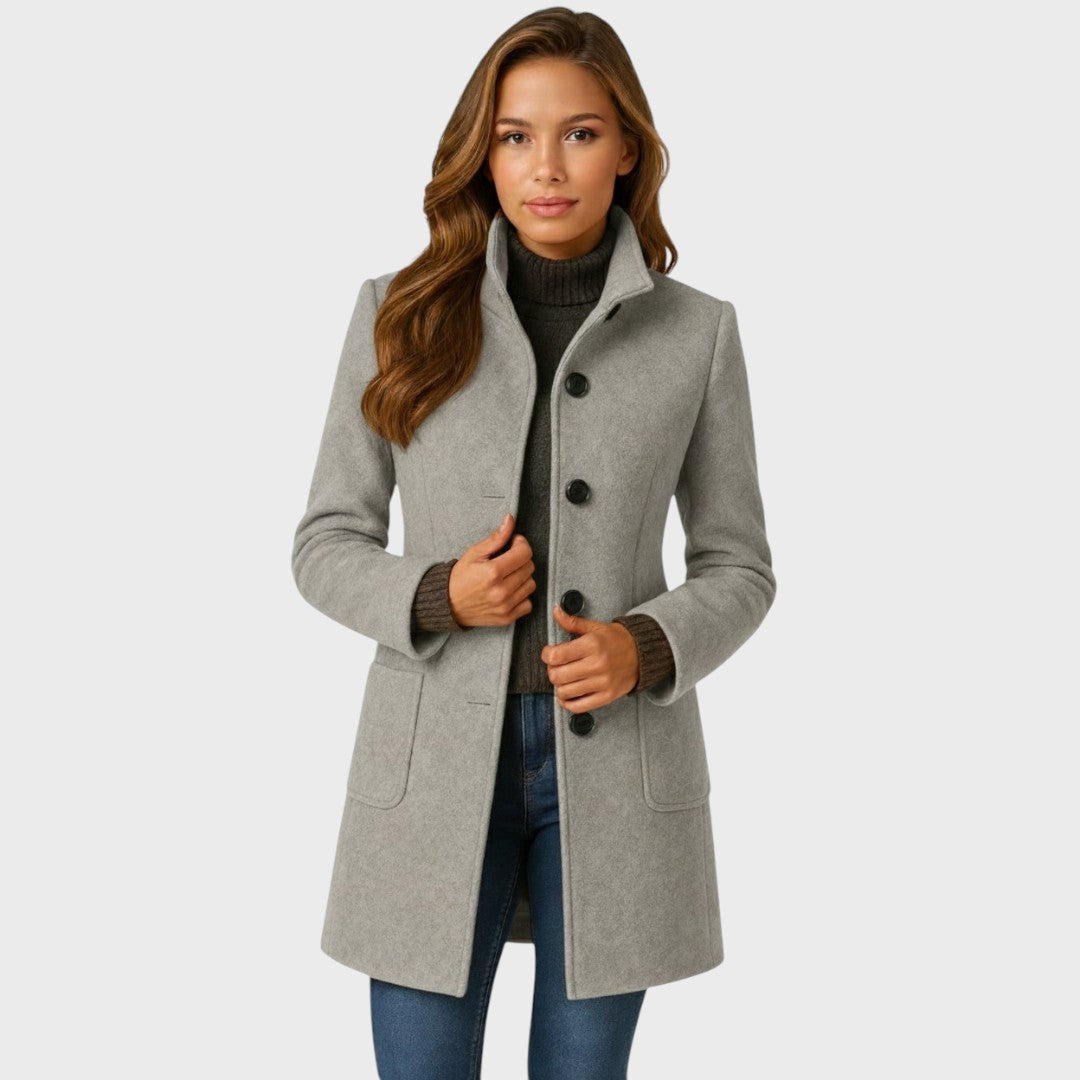 Women's grey mid-length tailored coat featuring a sleek stand collar, single-breasted button front, and patch pockets.