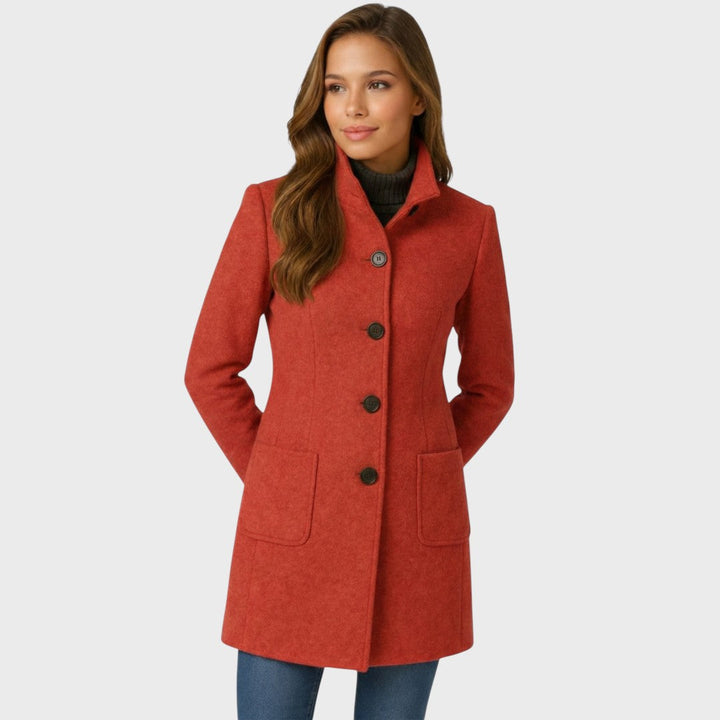 Tailored rust-colored button-up coat featuring a smart stand collar and practical front patch pockets.