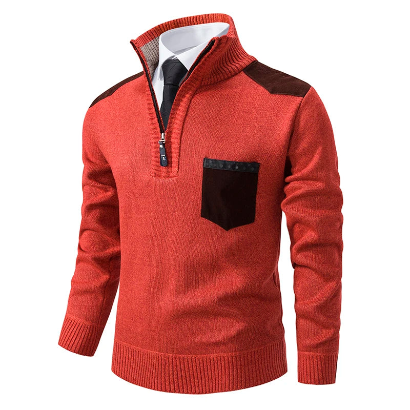 Orange marled knit quarter-zip jumper with brown contrast shoulder patches and a chest pocket, featuring a ribbed funnel neck.