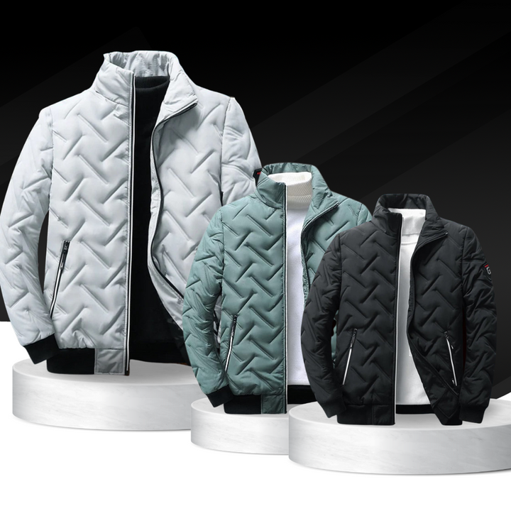 Men's quilted chevron padded jackets in grey, green, and black with stand-up collars and zip-secured side pockets.