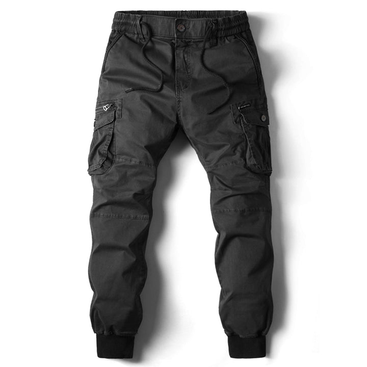 Black cotton utility cargo trousers with an elasticated drawstring waist, side zip pockets, and tapered cuffed ankles.