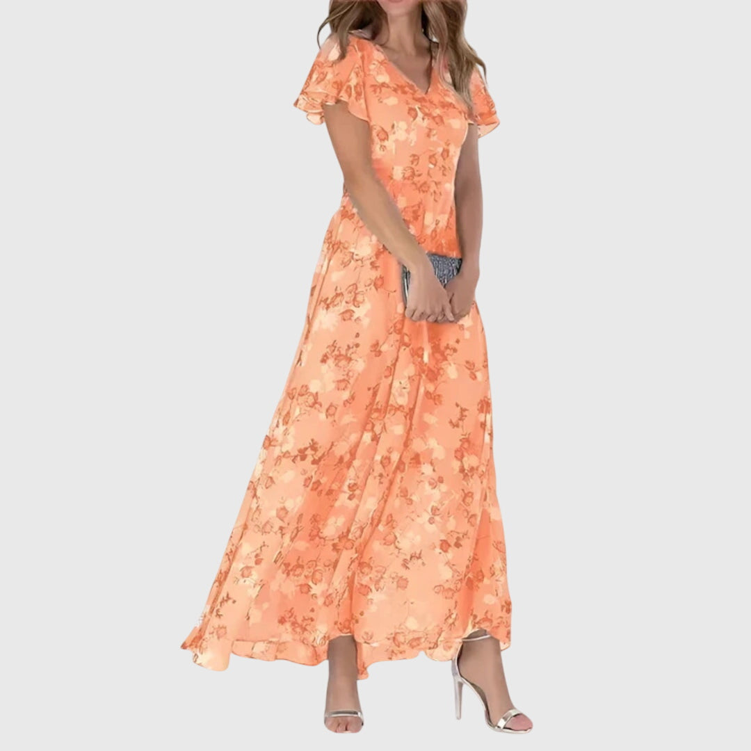 Phoebe women's figure-flattering midi dress in vibrant peach floral print with flutter sleeves.