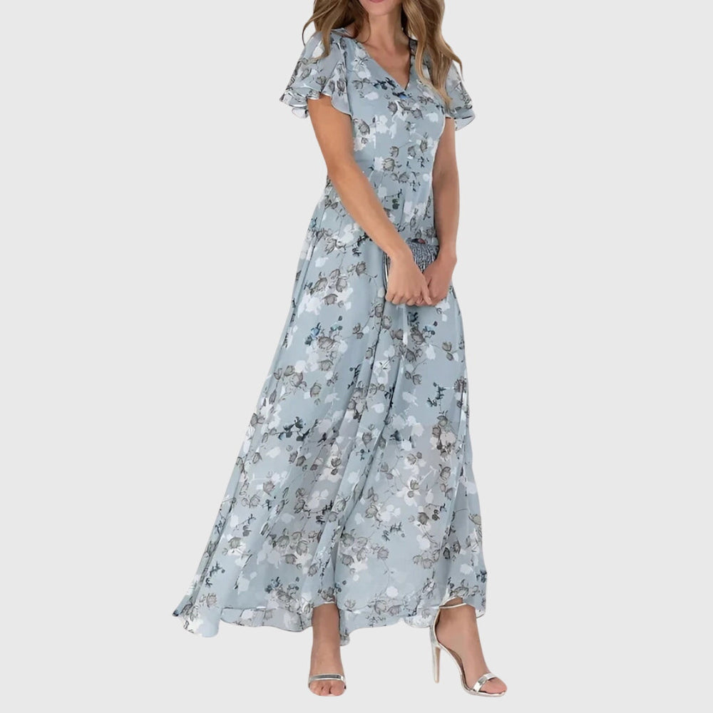 Phoebe women's figure-flattering midi dress in light blue floral print, with flutter sleeves and a flowing silhouette.