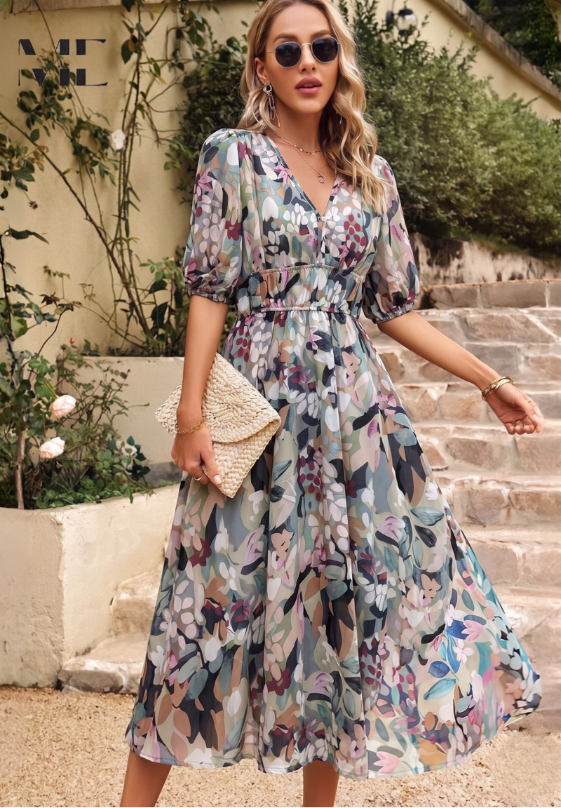 Woman wearing a midi-length floral dress with puff sleeves, a V-neckline, and a gathered waist in a garden setting.