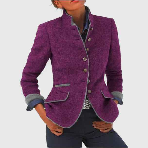 Purple wool-blend blazer featuring a stand collar, button-front closure, and grey contrast trim with flap pockets.