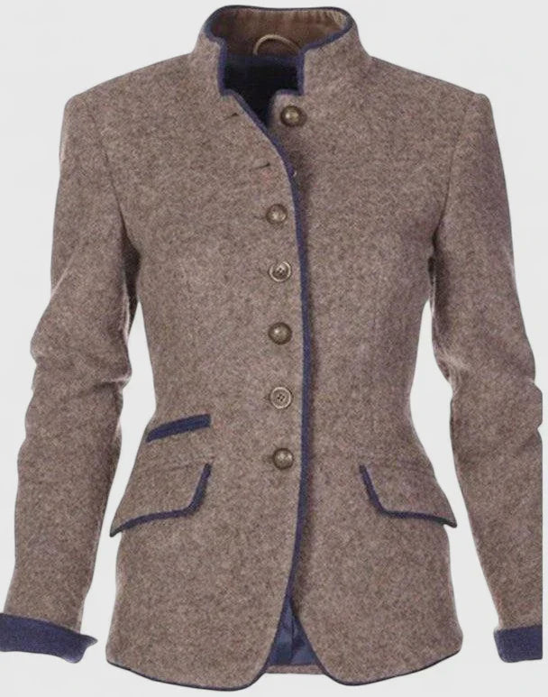 Tailored brown tweed blazer with a stand collar, button-front closure, and navy blue contrast trim on the pockets and cuffs.