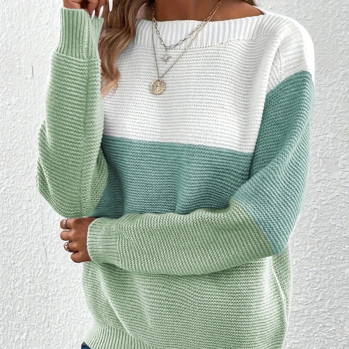 Chunky ribbed knit jumper with a boat neckline and white, sage, and mint green colour block panels.