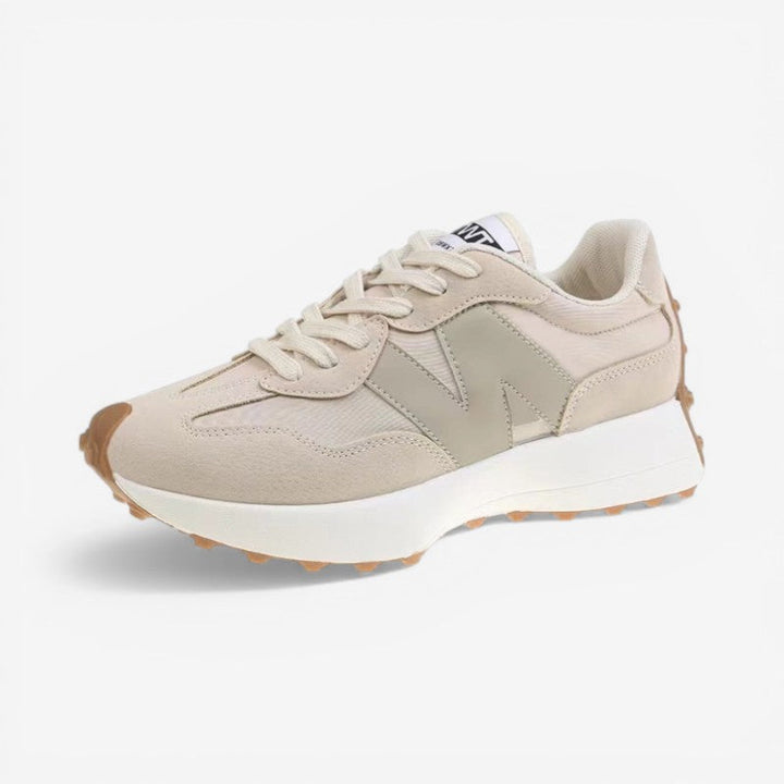 Poppy retro trainers in neutral beige with mixed-panel suede and fabric upper, white cushioned sole, and gum tread.
