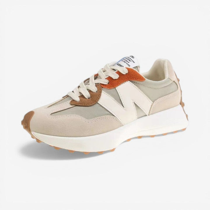 Poppy retro trainers in neutral tones with a mixed-material upper, lace-up front, and a textured gum sole.