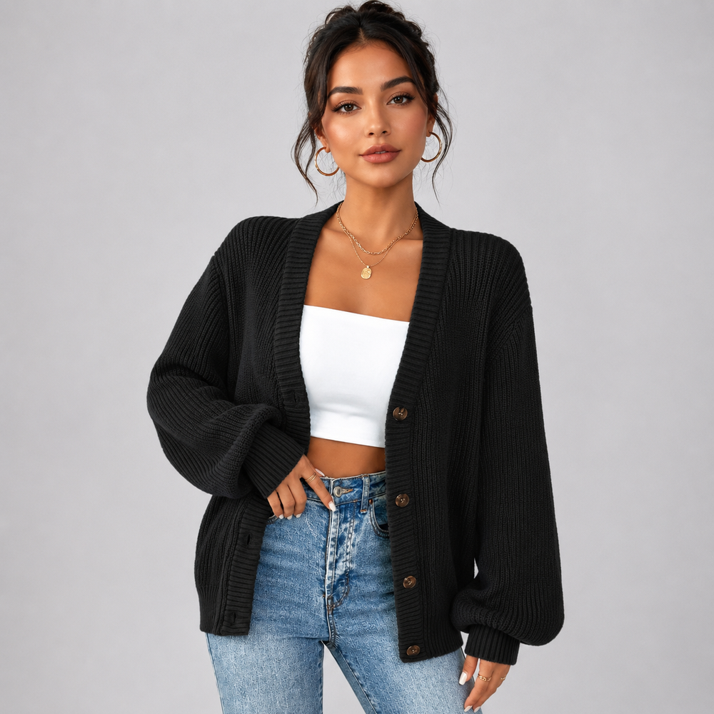 Black ribbed knit cardigan with a V-neck, front button closure, and relaxed oversized fit for effortless layering.