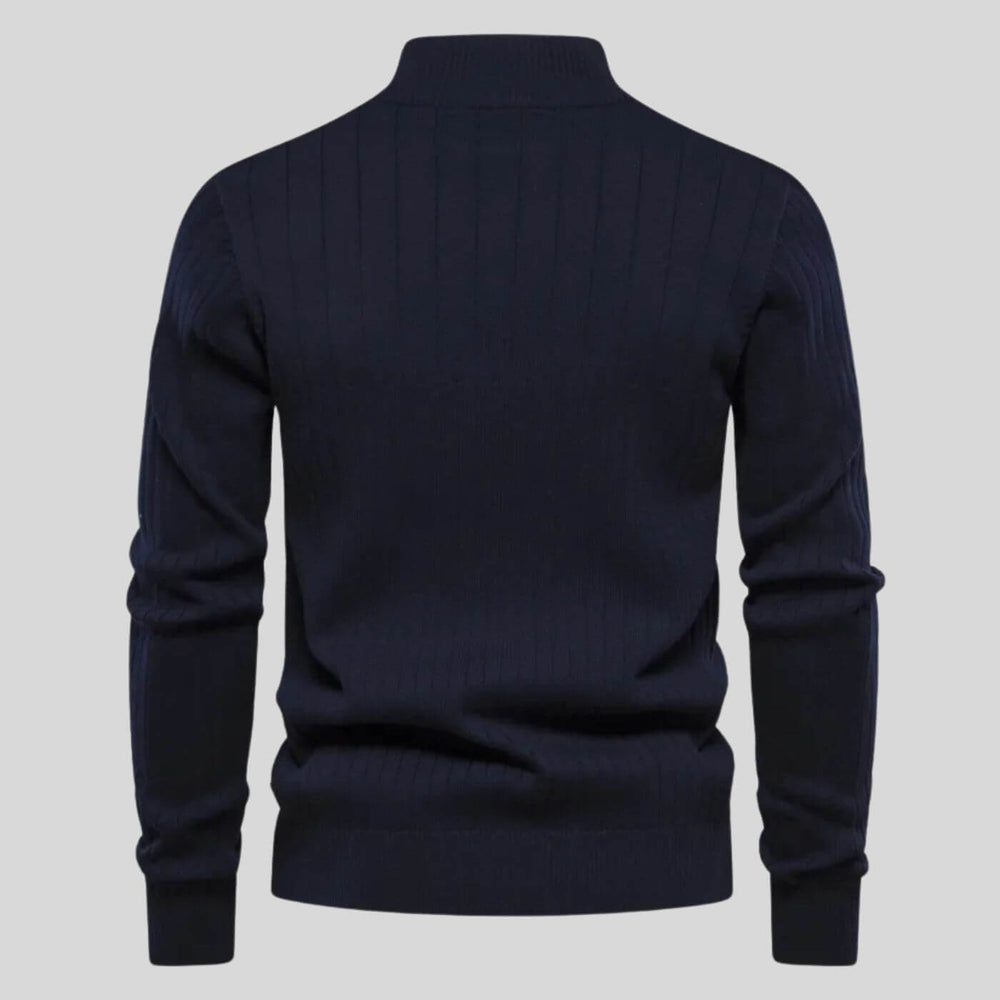 Back view of a navy blue men's ribbed knit half-zip jumper with long sleeves and a fitted hem.