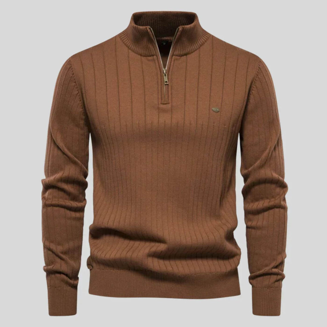 Men's brown ribbed knit jumper featuring a half-zip collar, long sleeves, and a subtle chest logo detail.