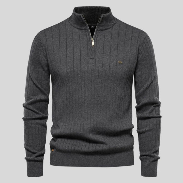 Charcoal grey men's ribbed knit half-zip jumper with a stand-up collar and long sleeves.