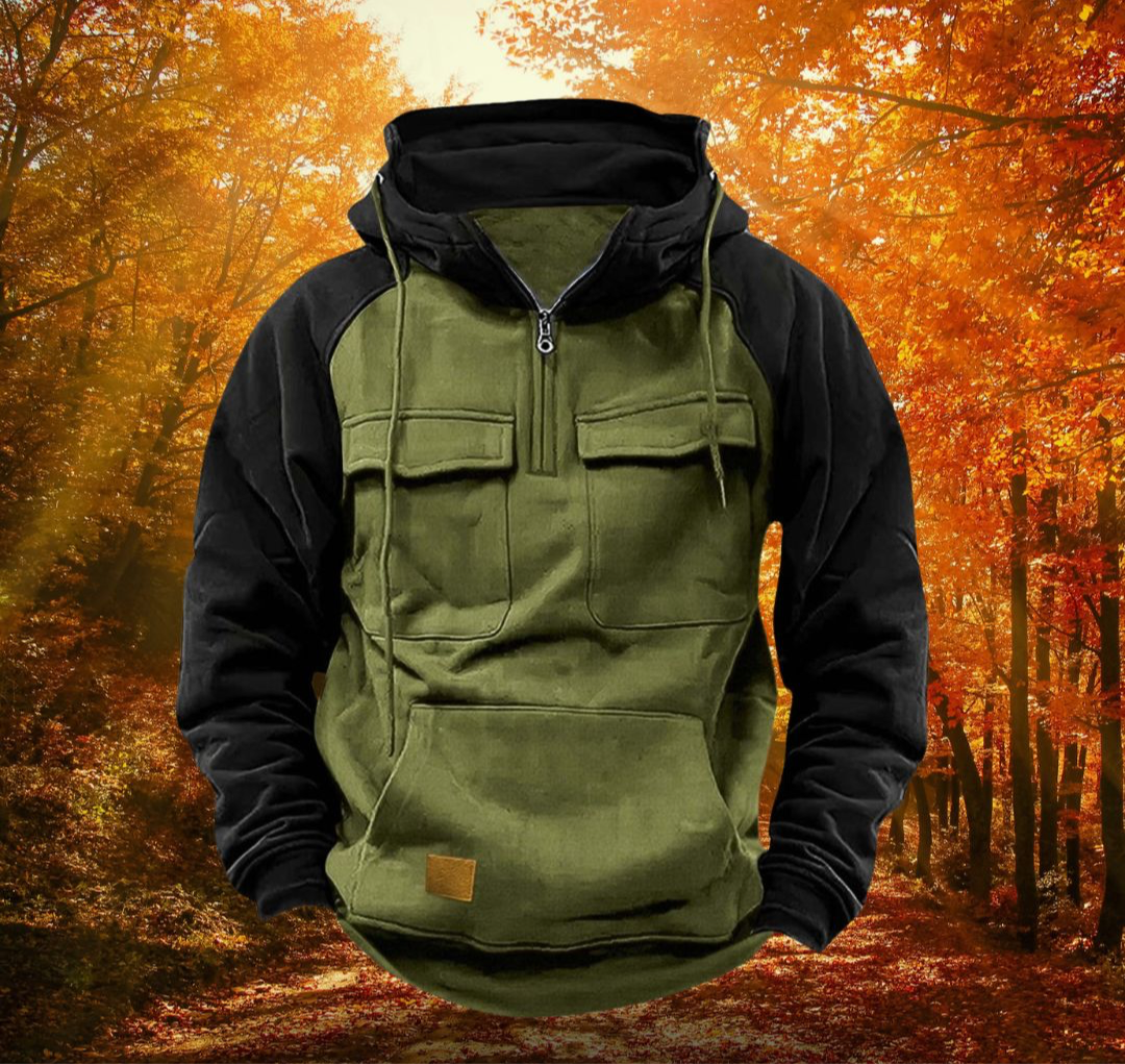 Men's olive and black colour-block half-zip hoodie with chest flap pockets, drawstring hood, and kangaroo pocket.