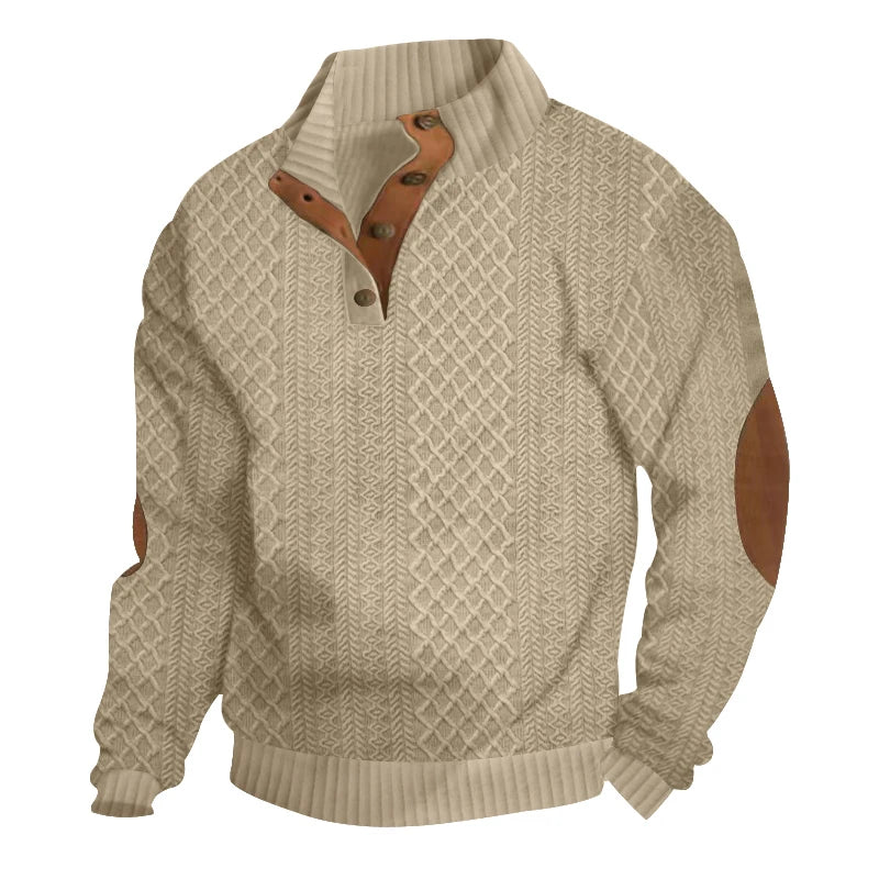 Beige cable knit jumper with a button-up stand collar and brown contrast elbow patches.