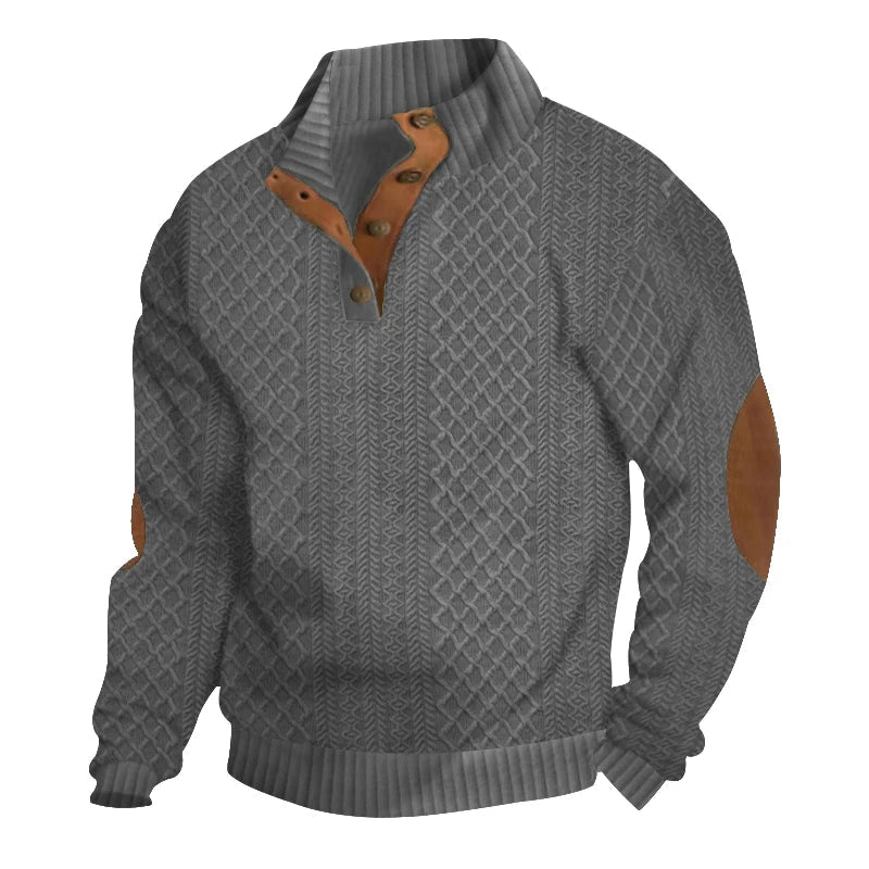 Grey cable knit jumper with a button-up stand collar and brown contrast elbow patches.