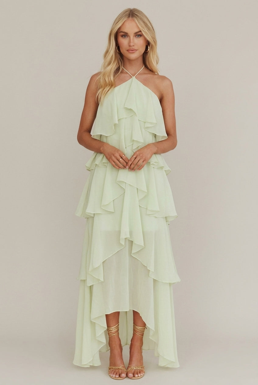 Rosalie women's floral halter tiered maxi dress in soft green, with flowing ruffles and a graceful silhouette.