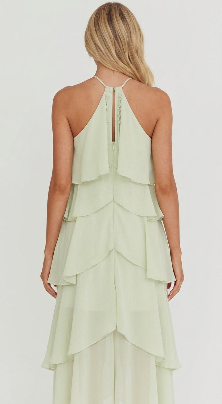 Rosalie women's floral halter tiered maxi dress in a soft green, featuring elegant ruffles and a flowing silhouette.