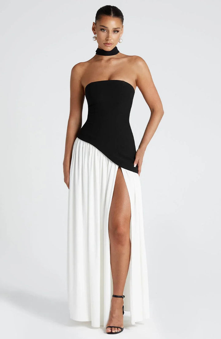 Black and white strapless corset maxi dress with a high leg slit and matching choker scarf detail.
