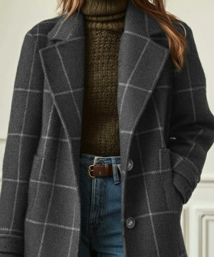 Charcoal wool-blend coat with a white windowpane check pattern, notched lapels, and a button-front closure.