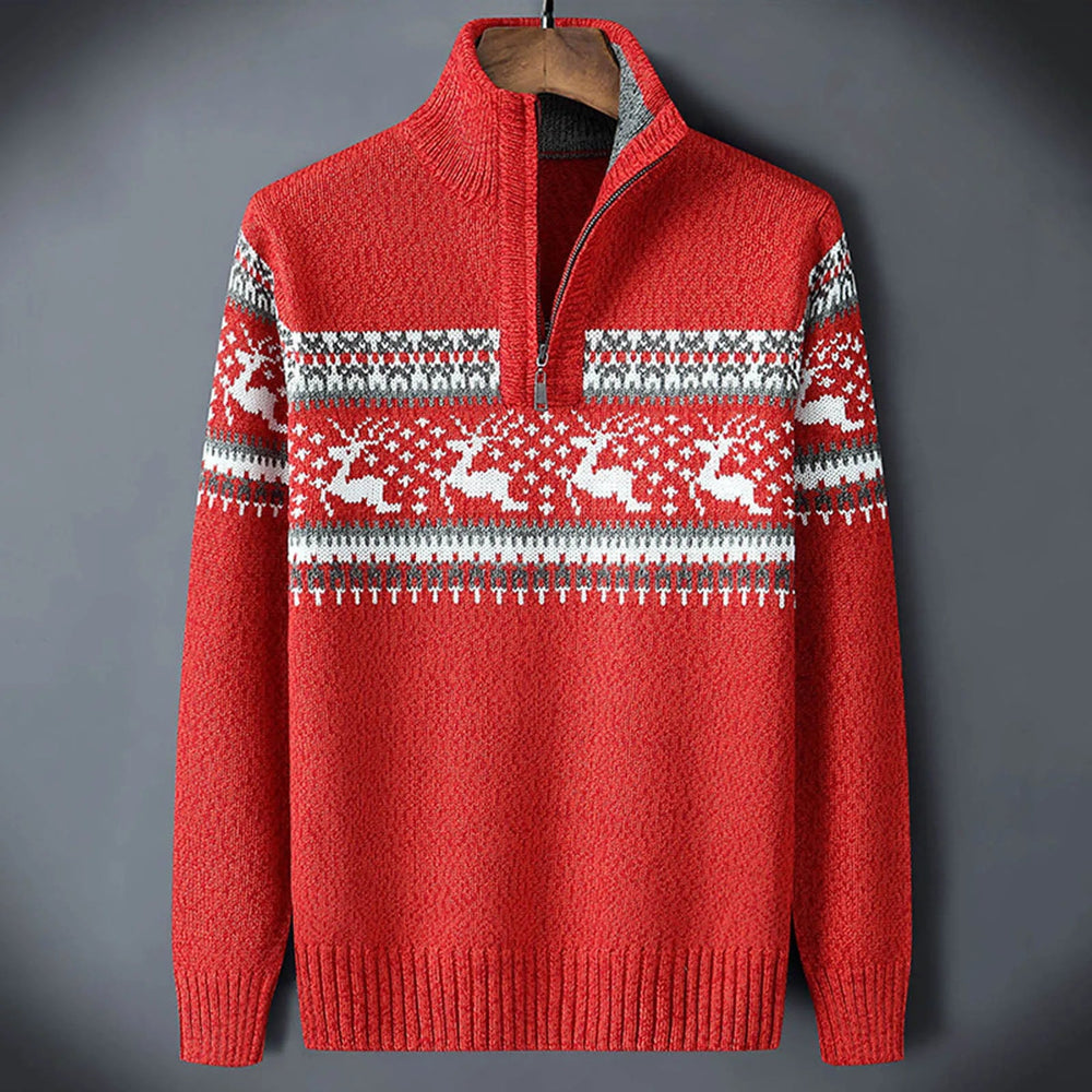 Red men's half-zip jumper featuring a white and grey Fair Isle reindeer pattern, stand collar, and ribbed cuffs.