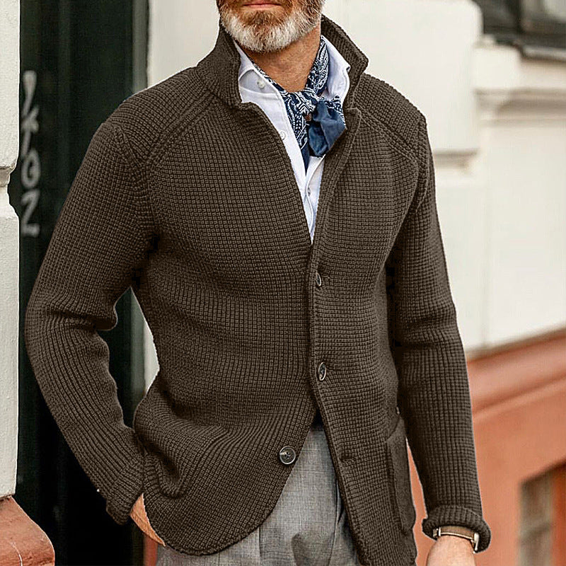 Dark brown textured knit cardigan with a standing collar, button-through front, and raglan sleeves for a refined, tailored look.