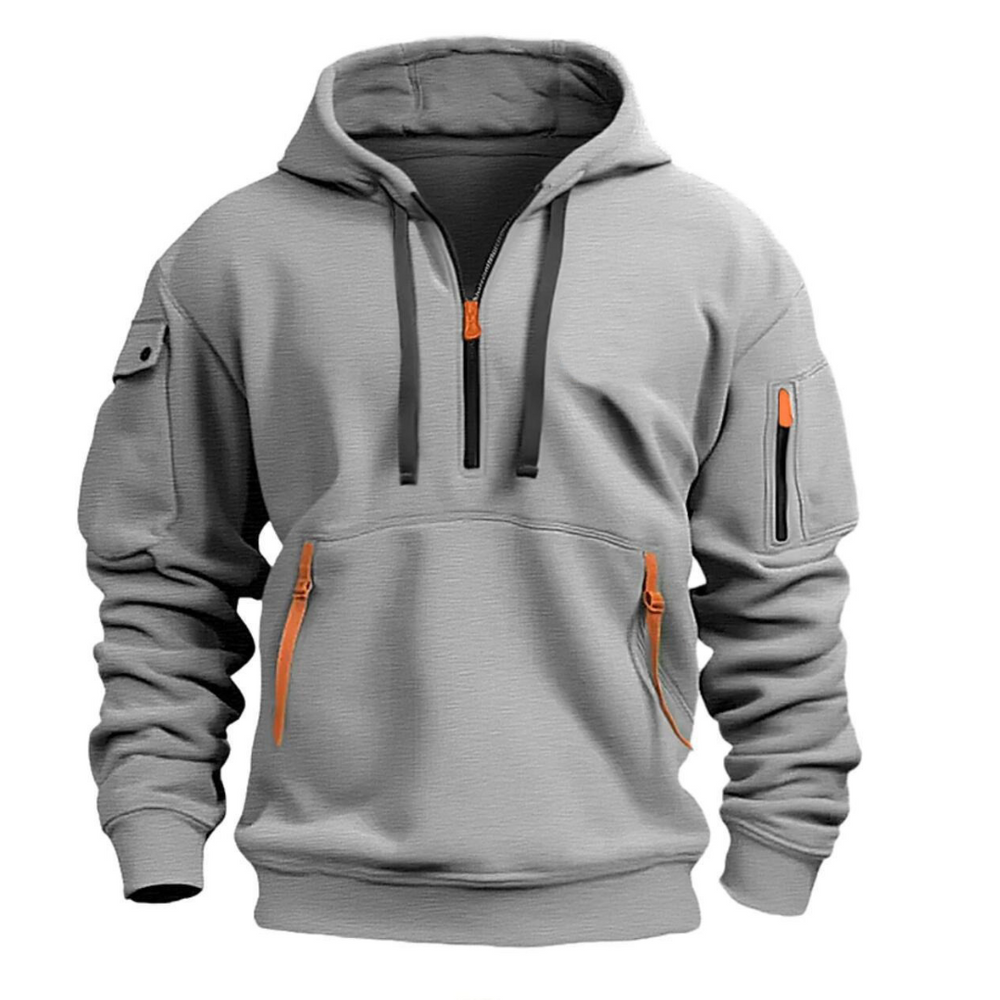 Grey men's half-zip hooded sweatshirt with orange zip pulls, front kangaroo pocket, and utility sleeve pockets.