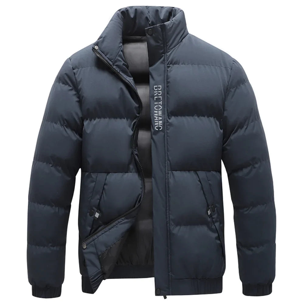 Men's navy blue quilted puffer jacket with a stand collar, full-length zip, and ribbed cuffs for winter warmth.