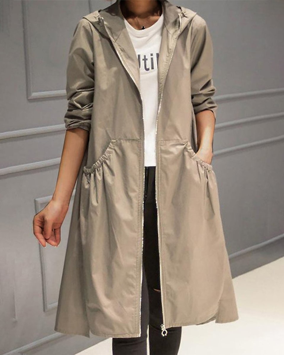 Taupe waterproof A-line trench coat featuring a hooded zip-up design and flattering ruched waist pockets.
