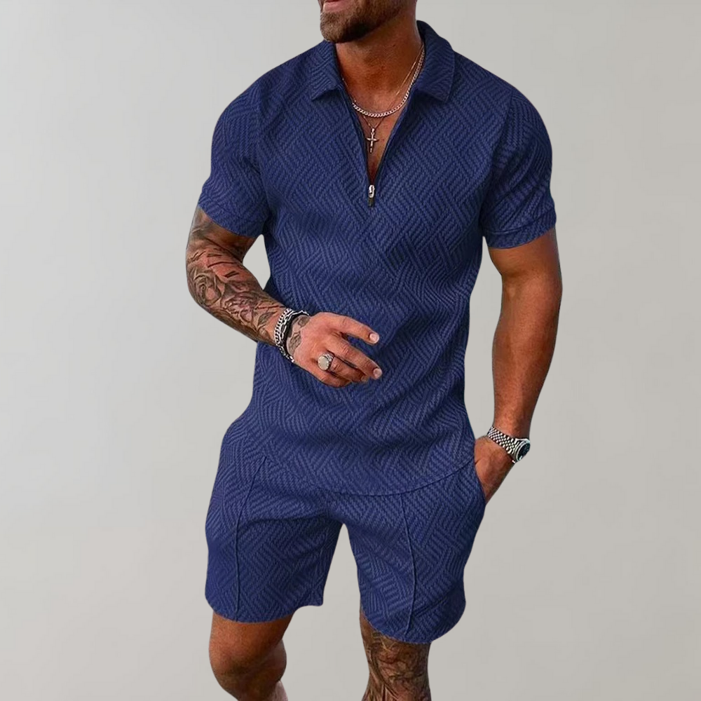 Navy blue men's zip-collar polo and matching shorts set featuring a textured geometric weave pattern.