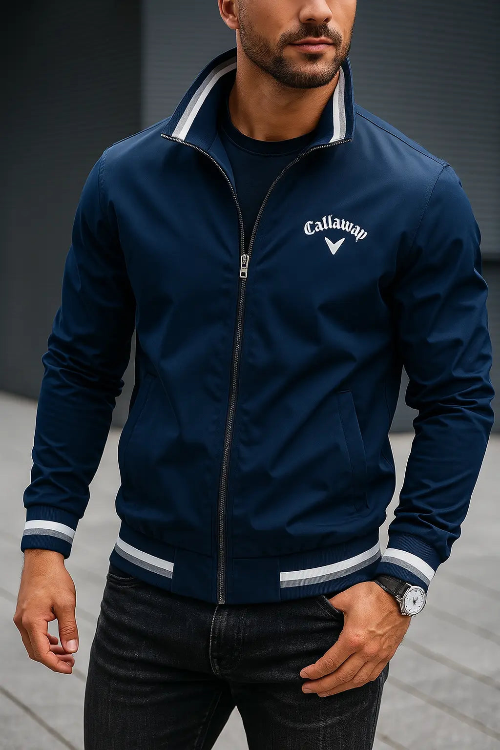 Navy blue zip-up bomber jacket with a stand collar, white striped ribbed trim, and Callaway logo on the chest.