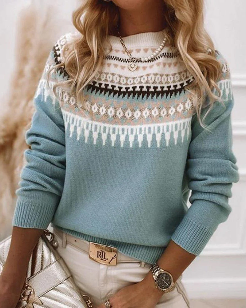 Blue Fair Isle crew neck jumper with a geometric yoke pattern, ribbed trim, and soft knit texture.
