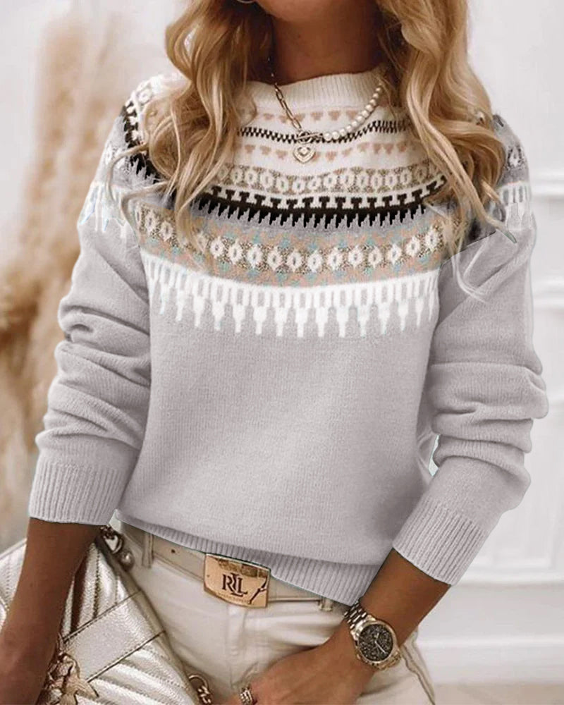 Women's light grey crew neck jumper featuring a multi-row Fair Isle geometric pattern on the yoke and ribbed trim.