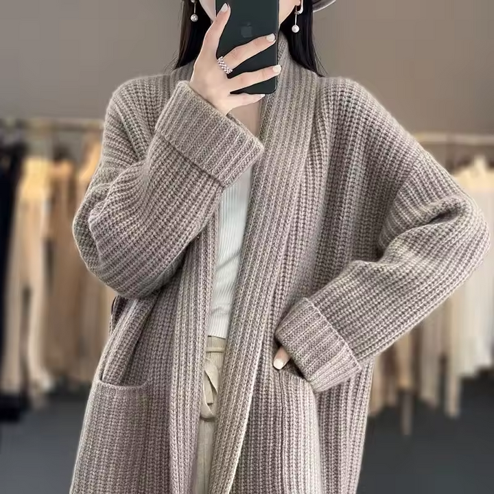 Sophie longline cardigan in a soft, chunky taupe knit with an open front and convenient side pockets.