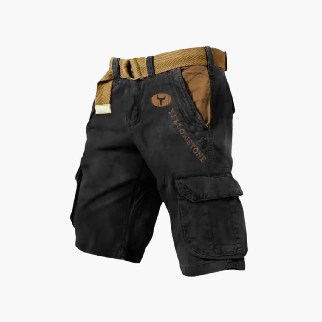 Black knee-length cargo shorts with tan contrast pockets, Yellowstone branding, and a matching utility belt.