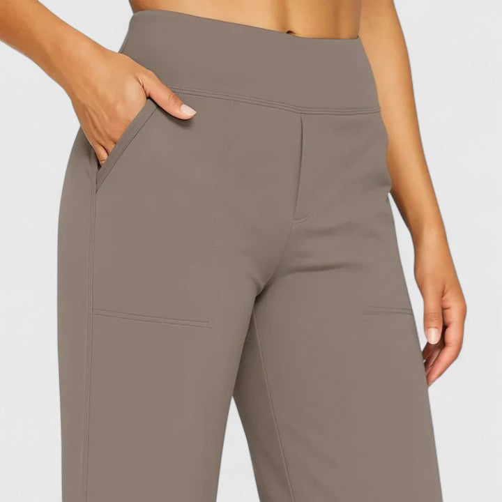 Vivienne women's pull-on wide waistband trousers in taupe, featuring deep side pockets and a smooth finish.