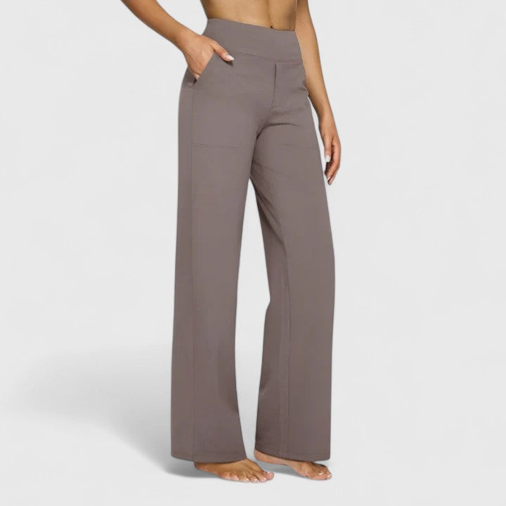 Vivienne women's pull-on wide waistband trousers in a versatile taupe, featuring deep side pockets and a relaxed wide-leg fit.