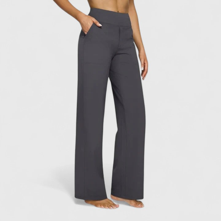 Vivienne women's charcoal pull-on wide waistband trousers with deep side pockets and a relaxed, refined finish.