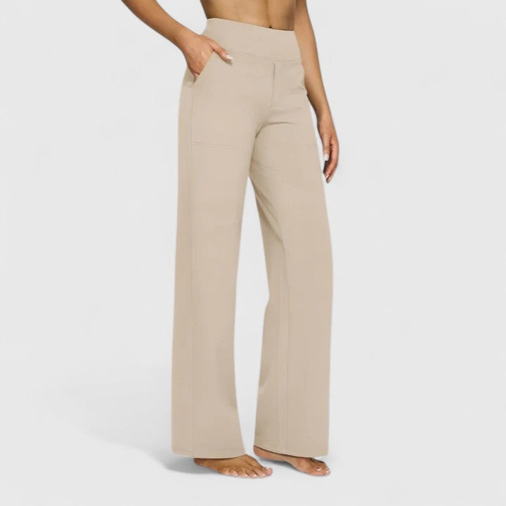 Vivienne women's pull-on wide waistband trousers in a chic beige, featuring deep side pockets and a relaxed fit.