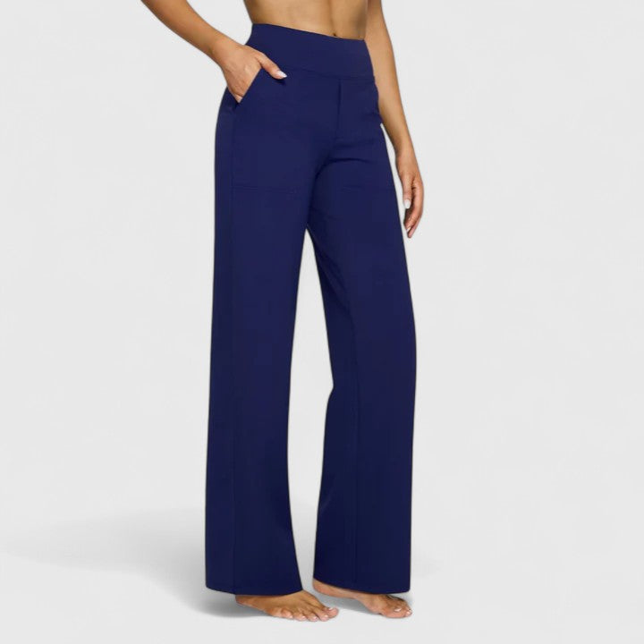 Vivienne women's navy pull-on wide waistband trousers with deep side pockets and a refined finish.